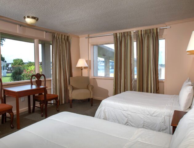 Yorktown Beach Hotel in Yorktown, Virginia with a view of the Yorktown River & hotel garden.