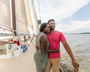 Man and woman hugging on a schooner