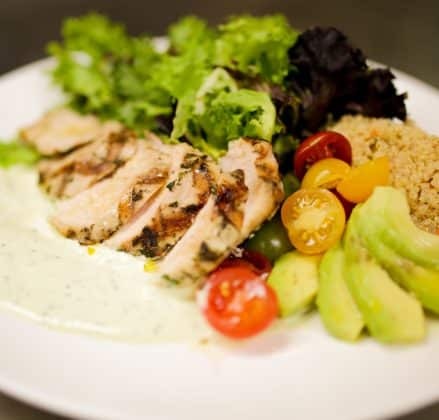 Grilled chicken and a salad near Yorktown Beach Hotel, a hotel near Williamsburg.