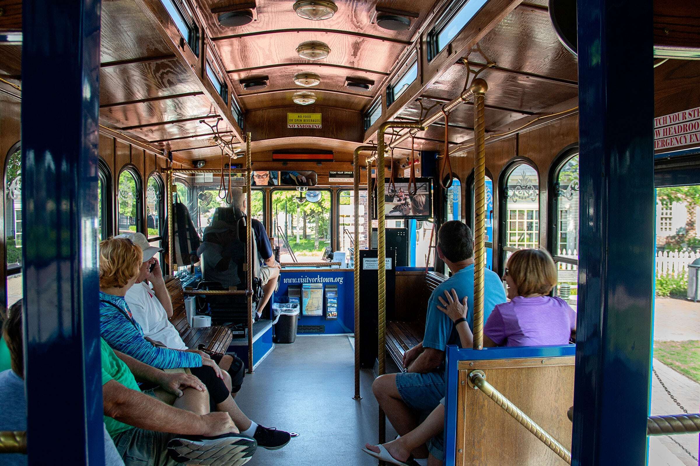 Old fashioned style trolley offering free rides near Yorktown Beach Hotel.