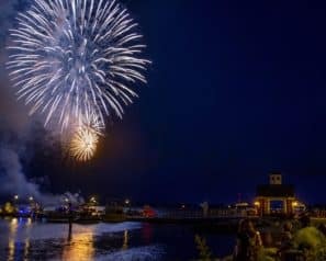 Fireworks in the night sky over the ocean